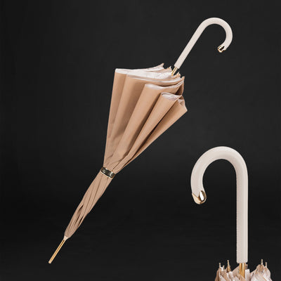 Leather-handled opulence in rain gear umbrella