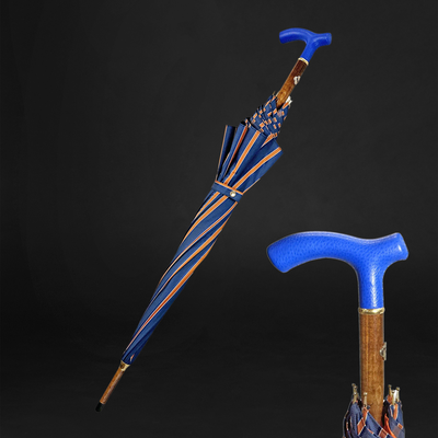 Elegant orange umbrella with a handmade blue leather handle