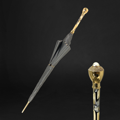 Rain umbrella with ergonomic handle for comfortable grip