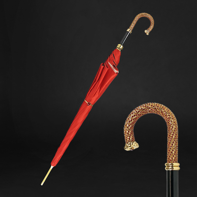 Romantic umbrella adorned with vibrant red roses and an elegant design