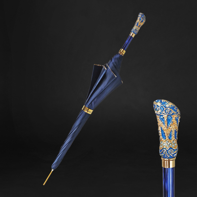 Majestic blue umbrella adorned with turquoise crystals