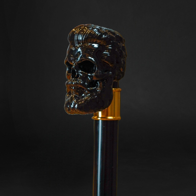Modern Sculpted Black Skull Handle and Gold Accents