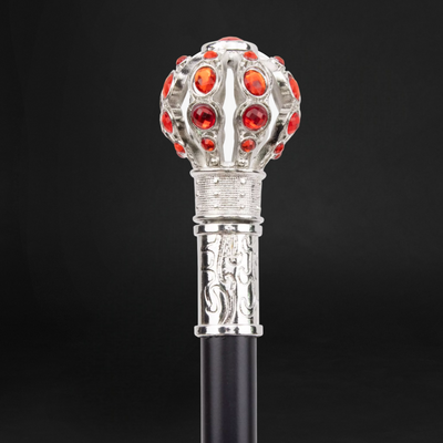 Stylish walking cane with decorative white and red ball handle